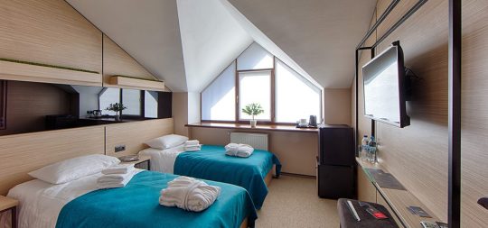 номер категории стандарт с двумя кроватями